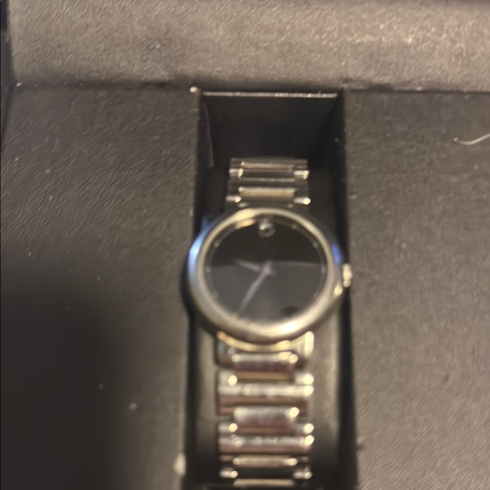 Movado Women's Silver and Black Watch